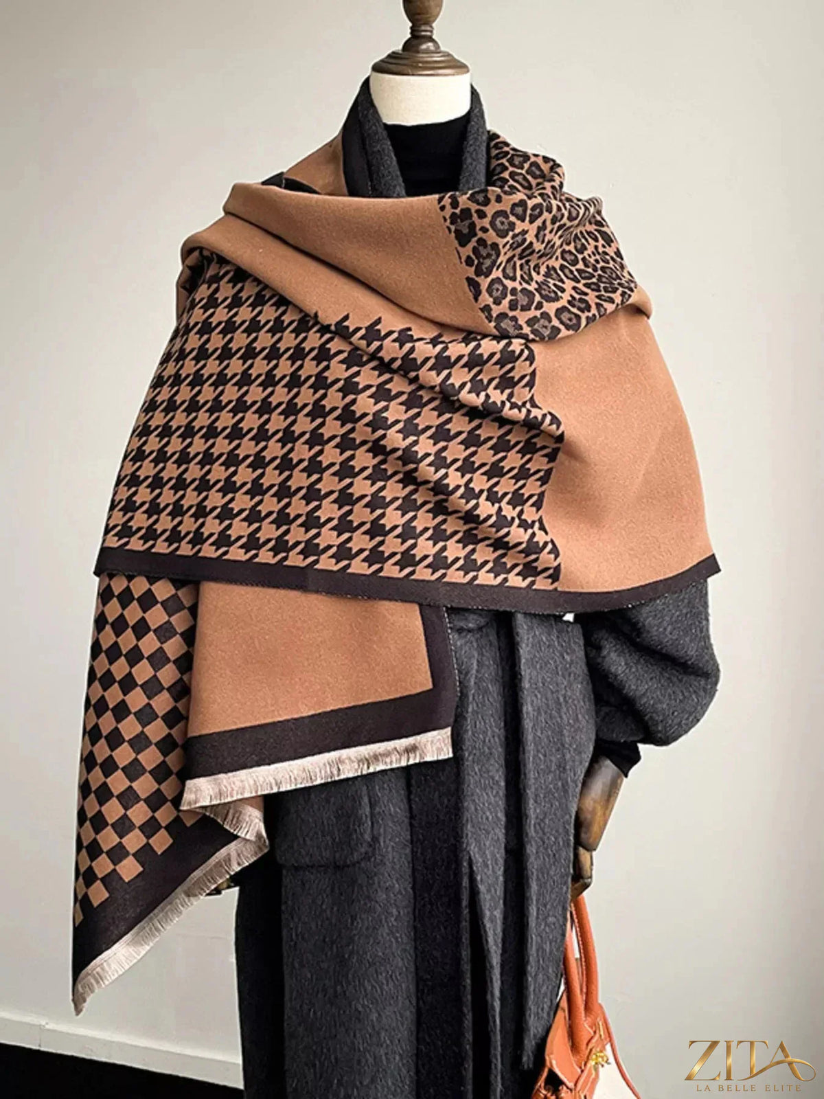 Checkered raw hem scarf by Zita La Belle Elite featuring a stylish black and white checkered pattern and fringed edges.