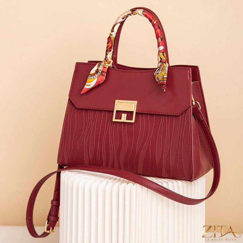 Zita La Belle Elite leather handbag with stylish scarf decor, featuring a sleek design and elegant detailing.