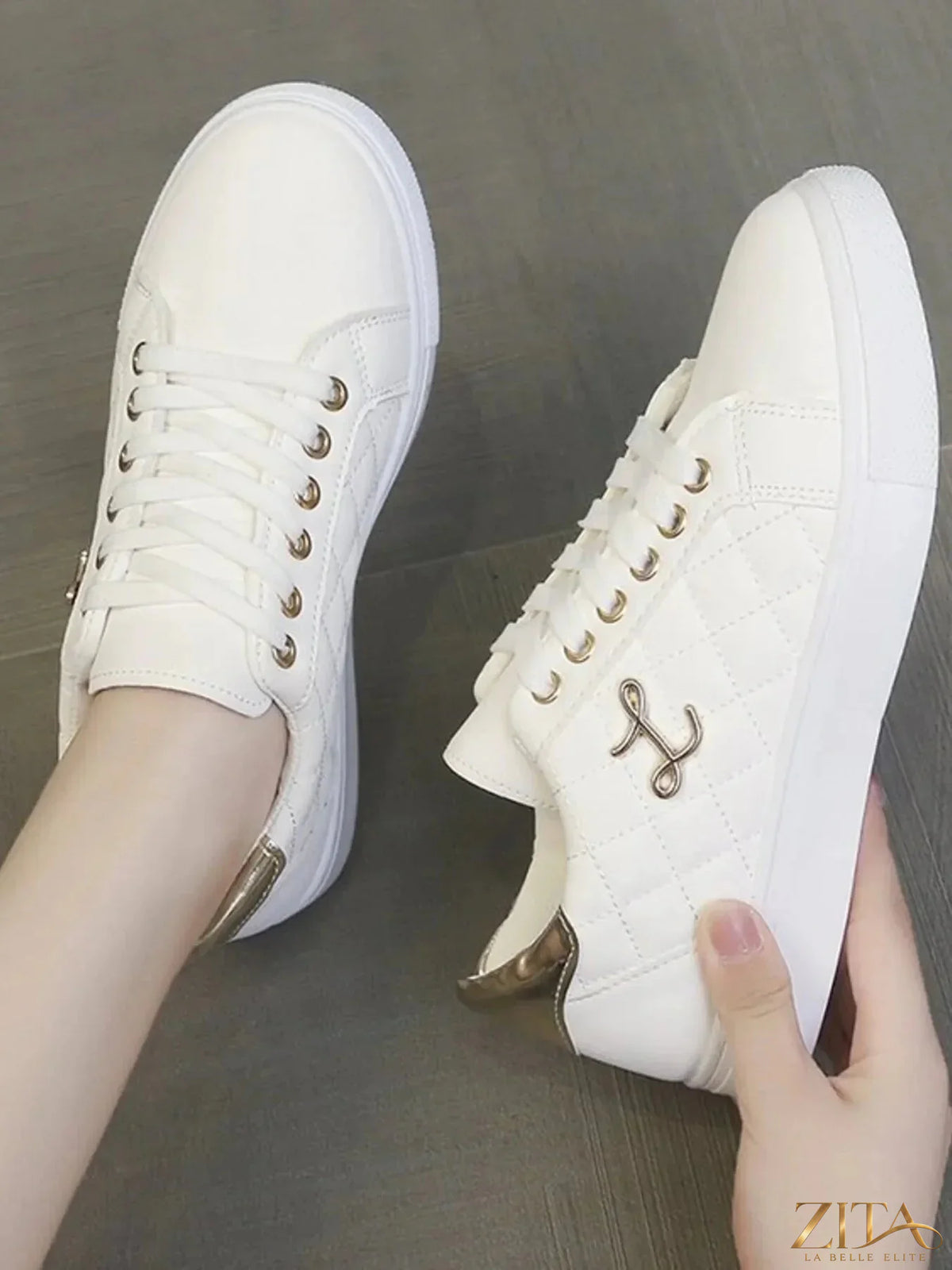 Zita La Belle Elite quilted platform sneakers with metallic gold accents, showing stylish design and textured quilting.