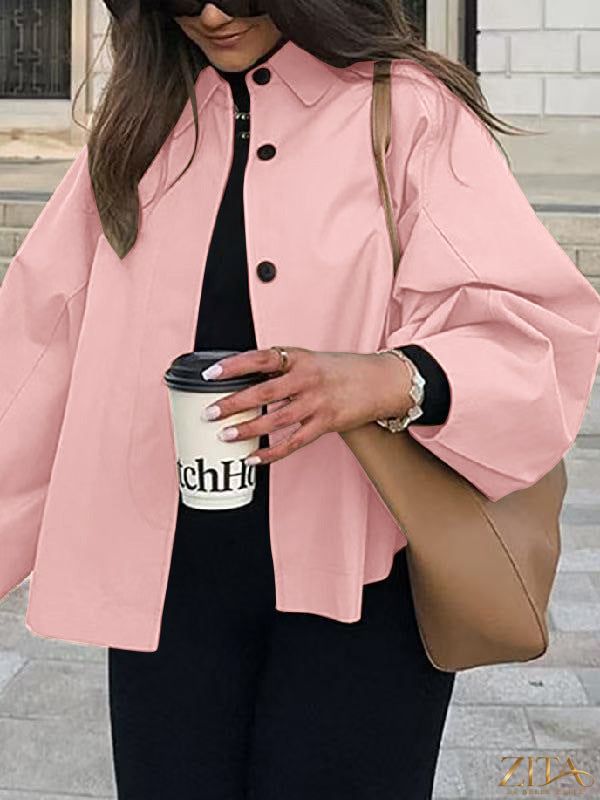 Women's French-style loose mid-length trench coat by Zita La Belle Elite, showcasing classic design and elegant workwear fashion.