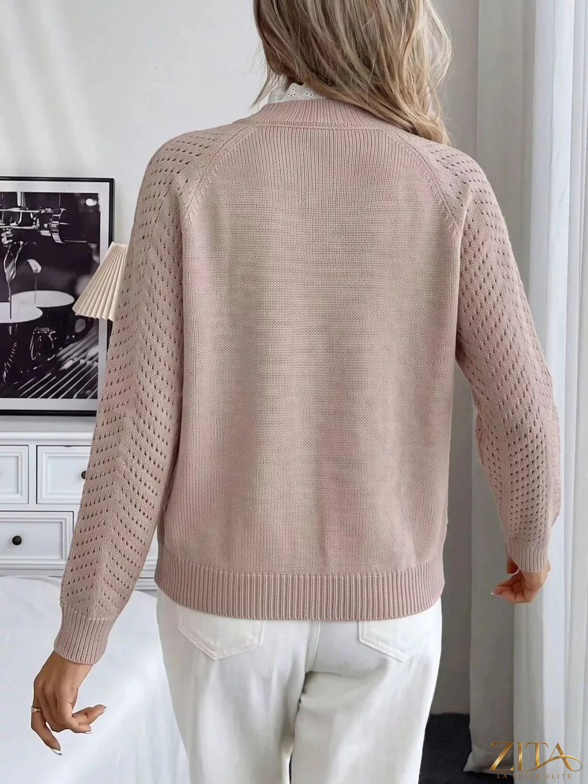 Zita La Belle Elite openwork mock neck sweater featuring intricate knit patterns and a fitted design in a stylish, lightweight fabric.
