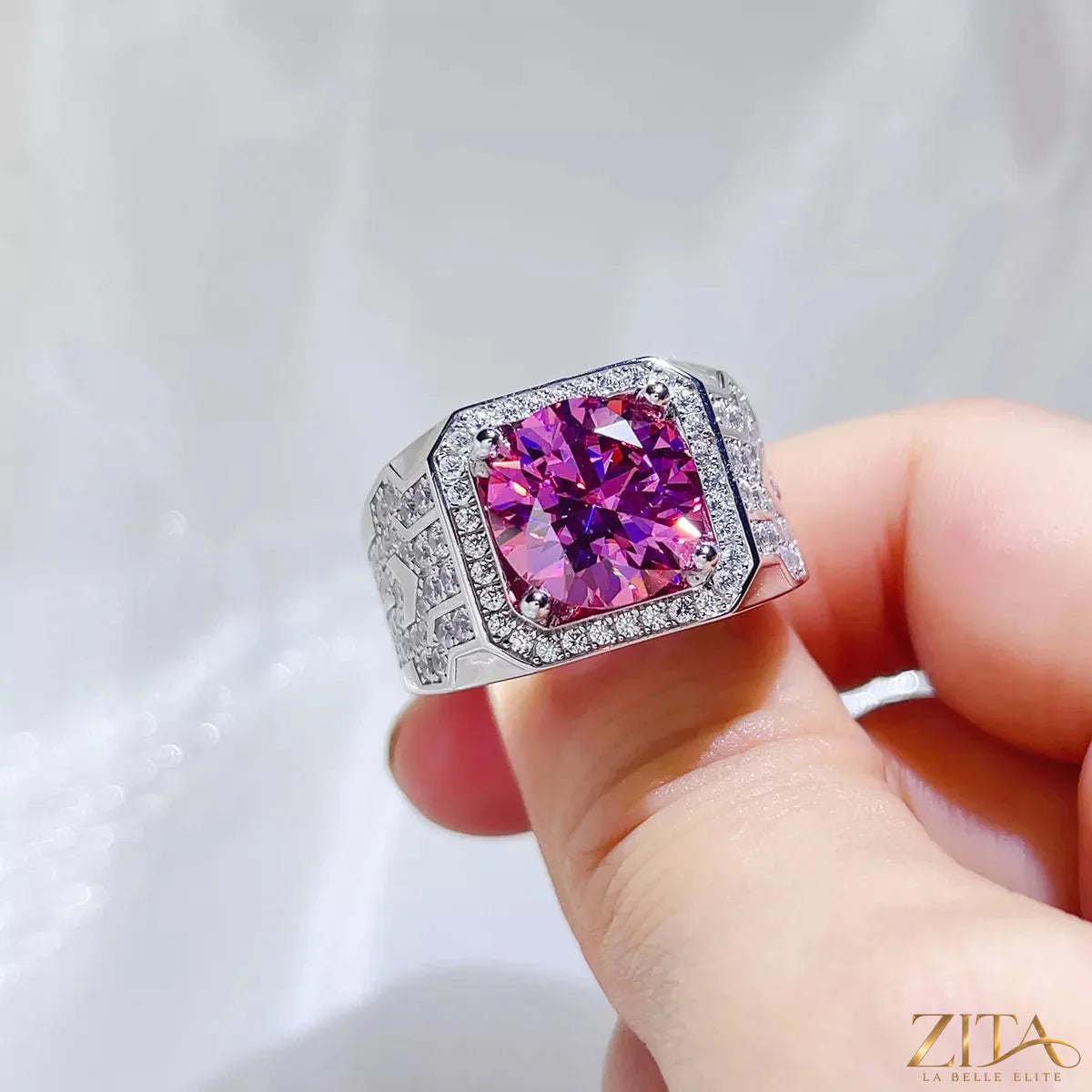 Sterling silver moissanite ring with a 5-carat center stone, featuring a sleek band design, on a neutral background
