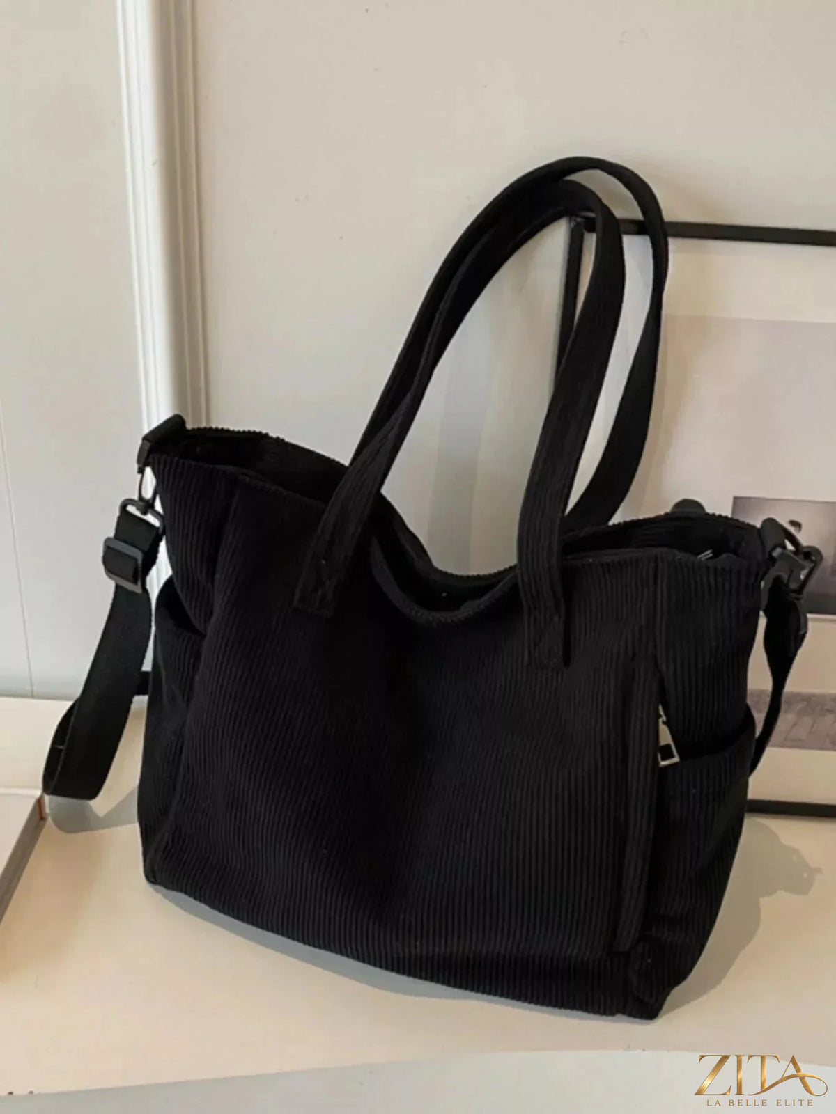 Zita La Belle Elite corduroy solid color handbag with top handle and zip closure, showcasing its stylish and textured design.