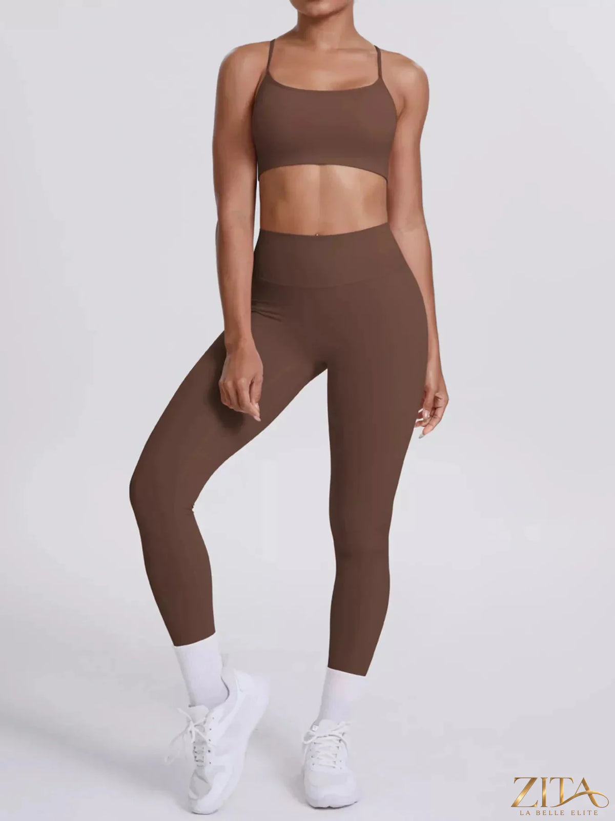 Zita La Belle Elite criss-cross back cami and matching black leggings active set on a model, perfect for workout or activewear.
