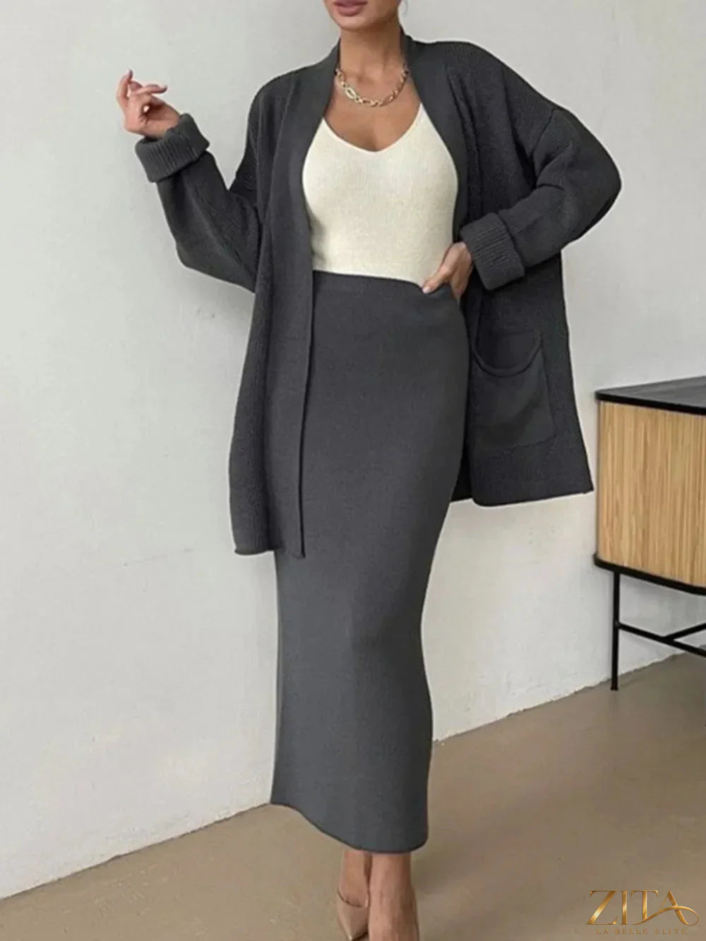 Zita La Belle Elite pocketed long sleeve cardigan and matching skirt sweater set, soft knit fabric, stylish and comfortable ensemble.