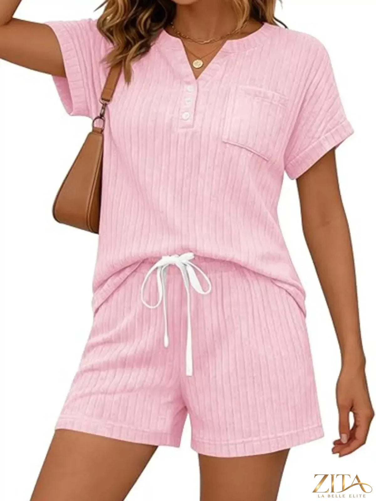 Casual ribbed knit tee and shorts set by Trendsi, featuring a relaxed fit and soft fabric in a stylish, comfortable design.