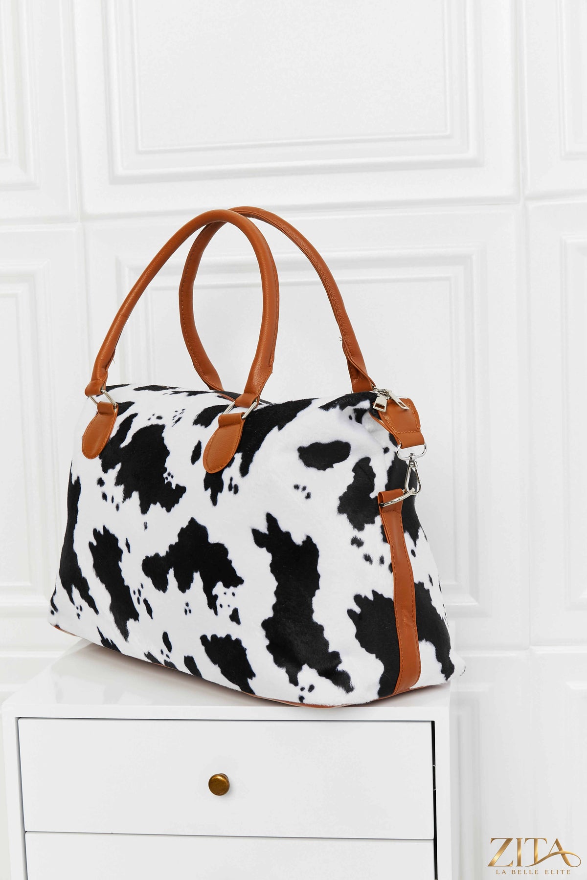Zita La Belle Elite animal print brushed weekender bag with black handles and zipper, stylish and spacious for travel.