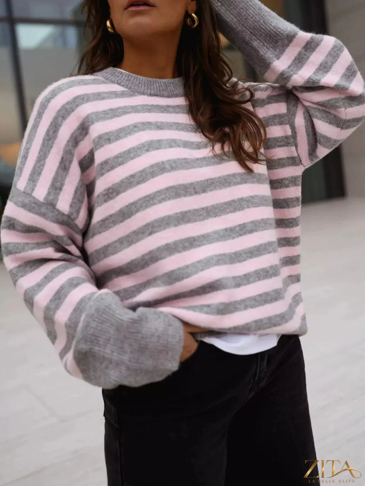 Striped crew neck sweater by Trendsi featuring multicolor horizontal stripes and a classic fit, shown on a mannequin.