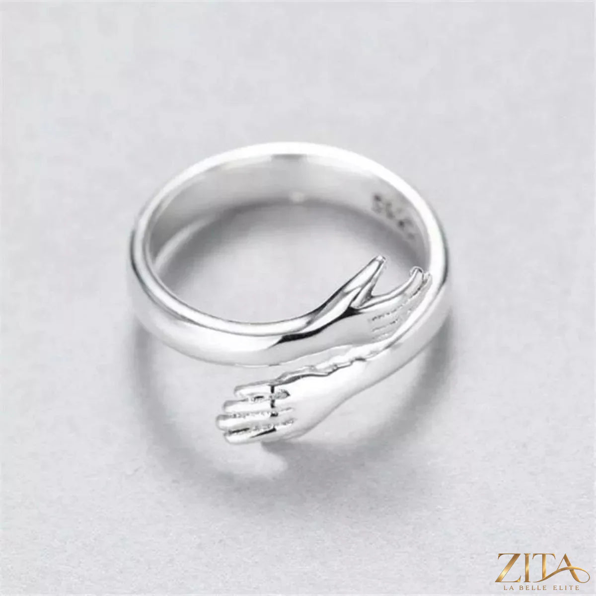 925 sterling silver hug bypass ring by Zita La Belle Elite, featuring sleek overlapping band design.