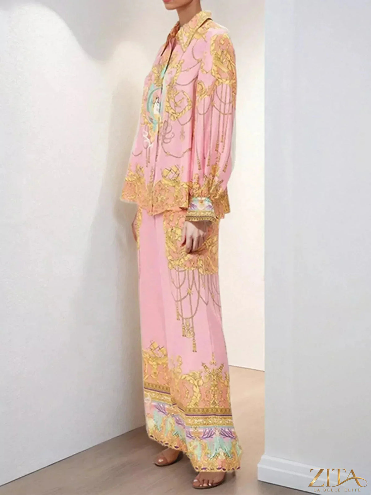 Printed lantern sleeve top and pants set by Zita La Belle Elite, featuring vibrant patterns and comfortable fit.