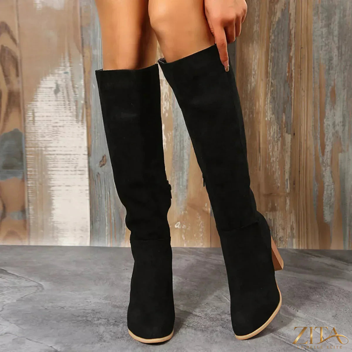 Zita La Belle Elite point toe block heel boots in black leather with sleek design and sturdy chunky heels.