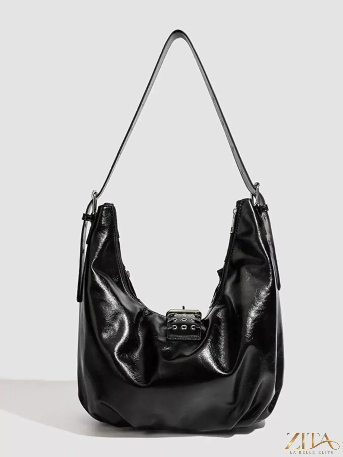 Zita La Belle Elite studded patent leather hobo shoulder bag with metallic accents and spacious interior.