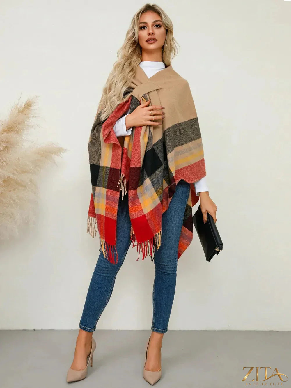 Fringe contrast plaid poncho by Trendsi featuring a stylish plaid pattern, fringe details, and cozy fabric for layered fall outfits.