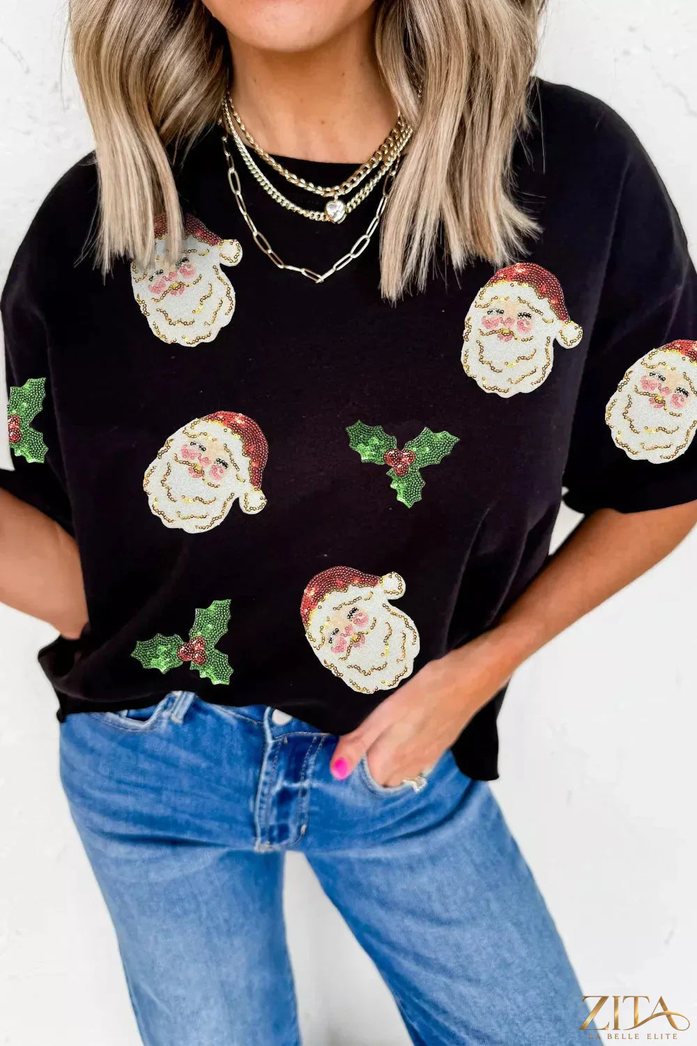 Christmas Holly Santa Claus sequin patched graphic T-shirt by Trendsi featuring festive holiday design and colorful holiday imagery.