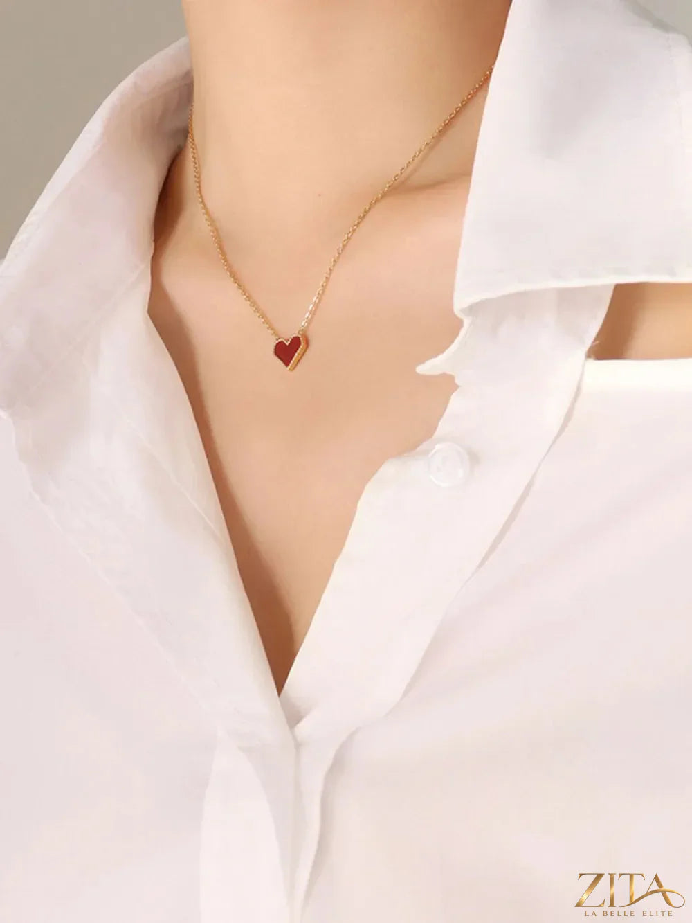 Titanium steel heart necklace by Zita La Belle Elite featuring a polished, elegant heart pendant on a sleek chain.
