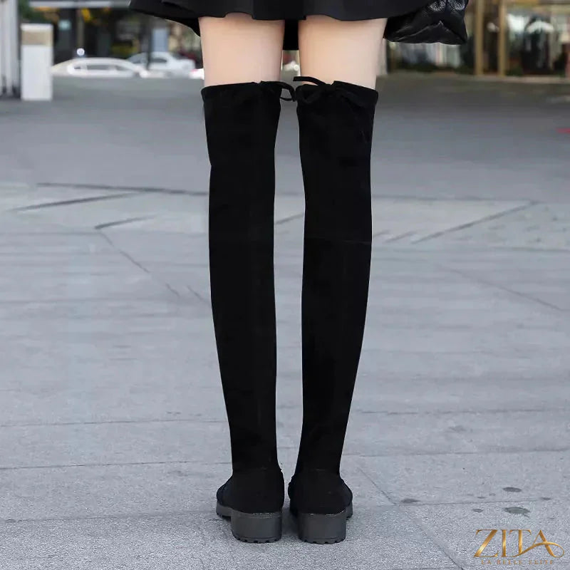 Over-the-knee block heel boots by Zita La Belle Elite featuring black faux leather and a sleek, stylish design.