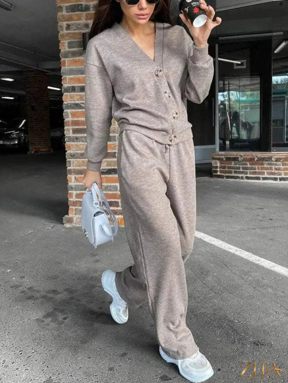 Zita La Belle Elite full size button-up long sleeve top and pants set, shown in a stylish, coordinated outfit on a model.