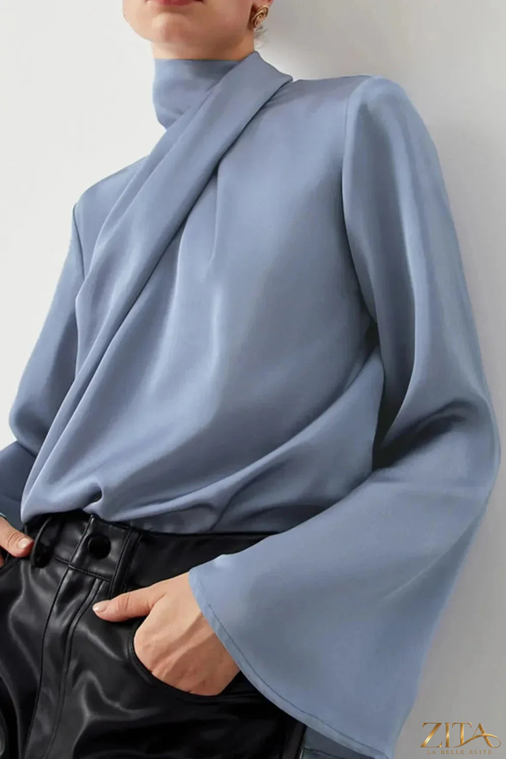 Zita La Belle Elite cutout turtleneck long sleeve blouse in black, showcasing a stylish high-neck design and fitted silhouette.