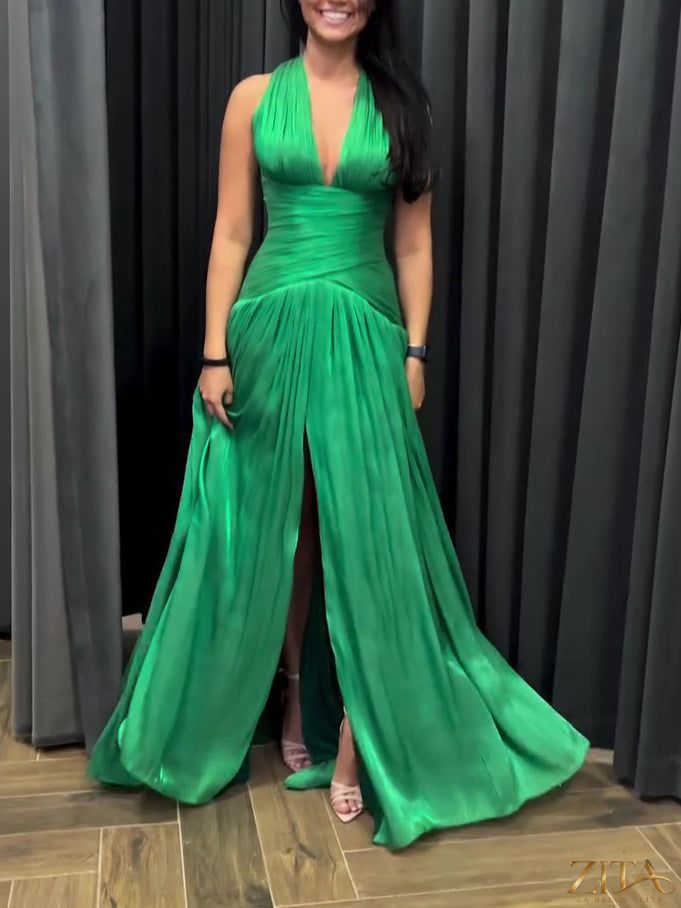 Emerald green Zita La Belle Elite gown with plunging neckline, pleated skirt, and side slit, perfect for formal occasions.