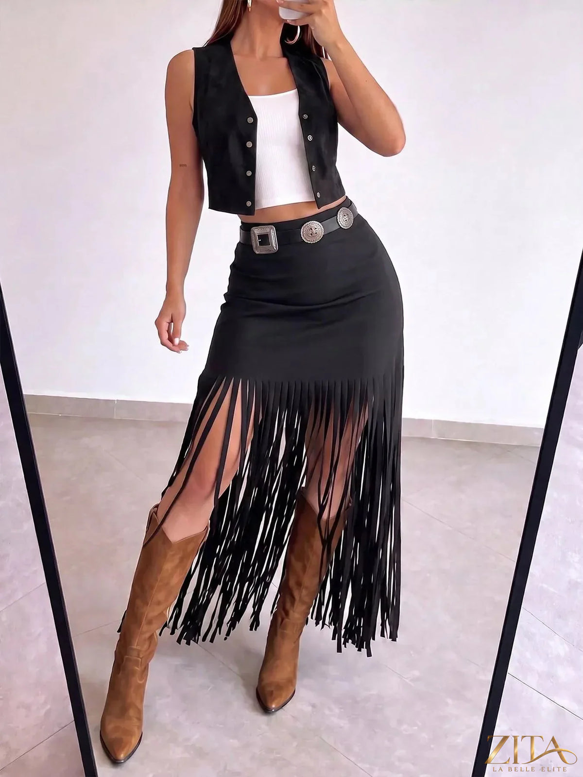 Zita La Belle Elite high-waisted fringe midi skirt with flowing fabric and layered fringe details on a model.