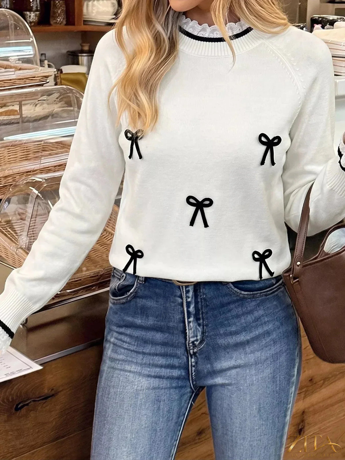 Zita La Belle Elite bow-embellished lace trim sweater featuring delicate lace details and a stylish, feminine design.