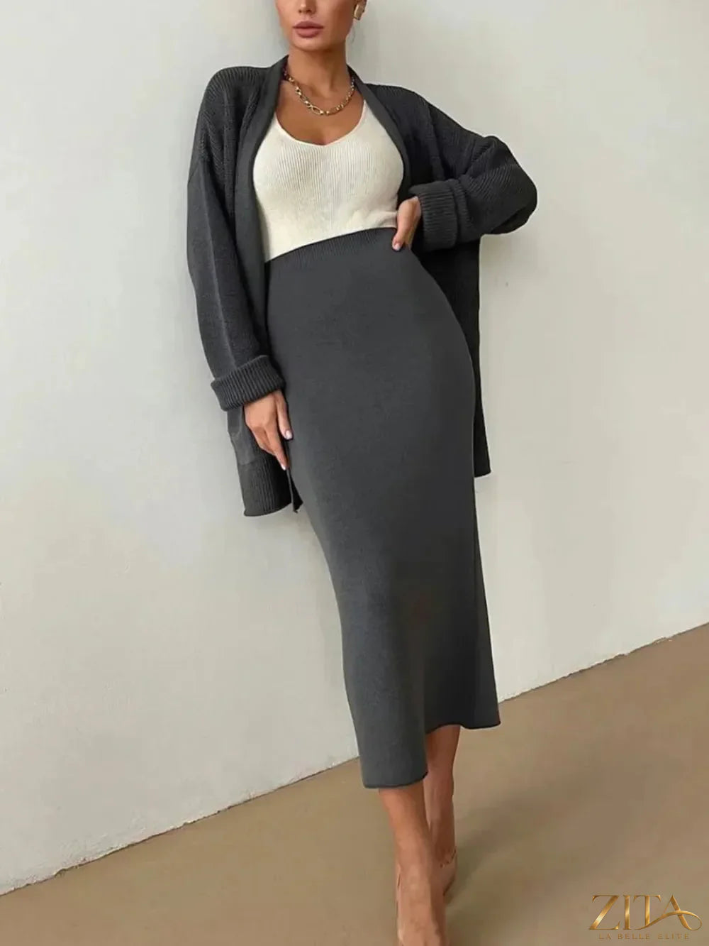 Zita La Belle Elite pocketed long sleeve cardigan and matching skirt sweater set, featuring a cozy knit design and front pockets.