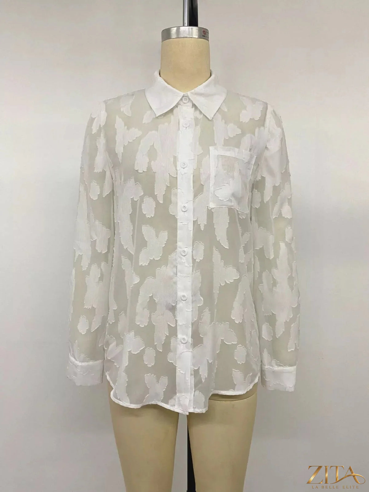 Zita La Belle Elite sheer button-down shirt with long sleeves and classic collar, lightweight and semi-transparent fabric.