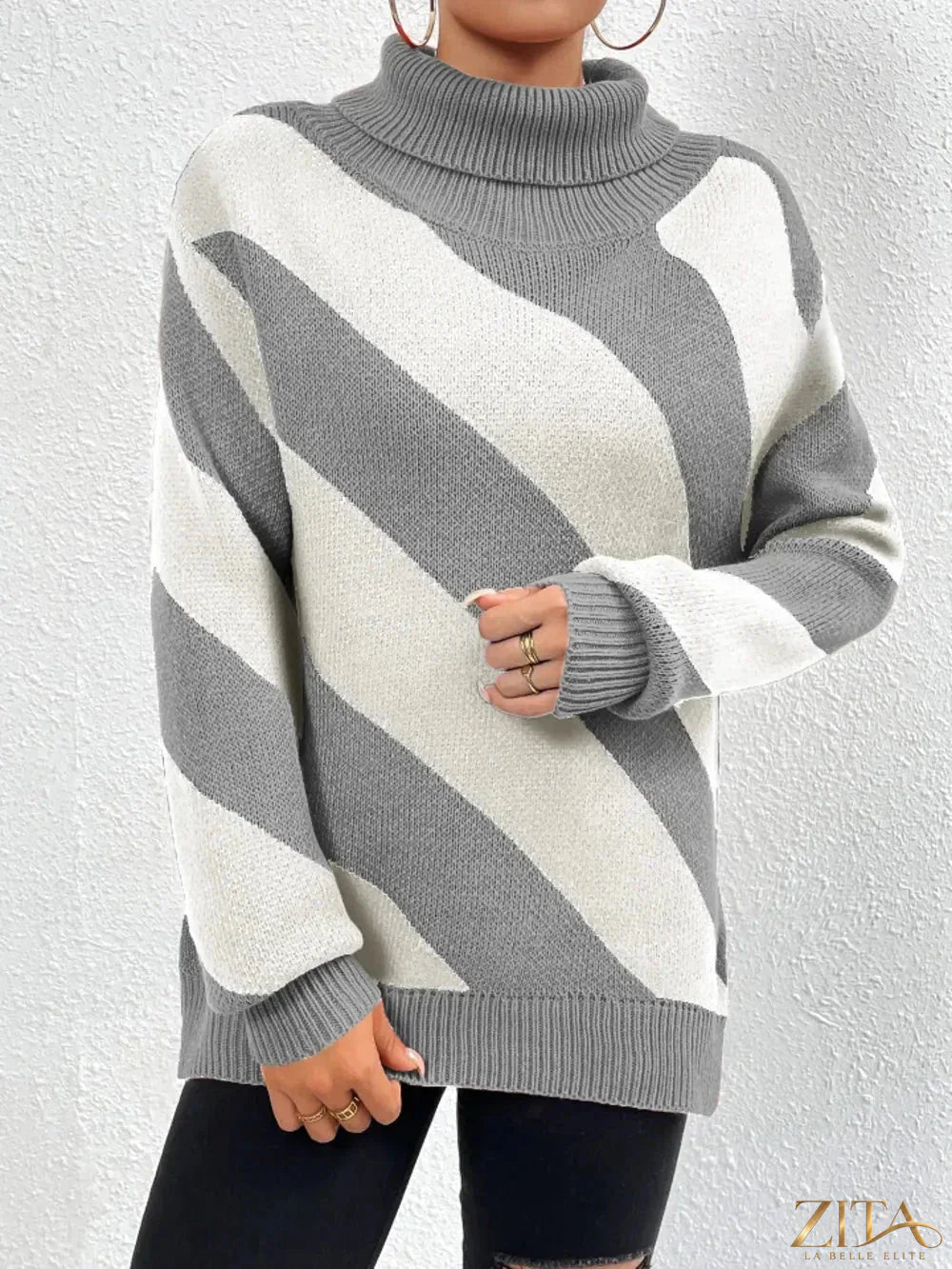 Striped turtleneck dropped shoulder sweater by Trendsi, featuring a cozy design with bold horizontal stripes and relaxed fit.