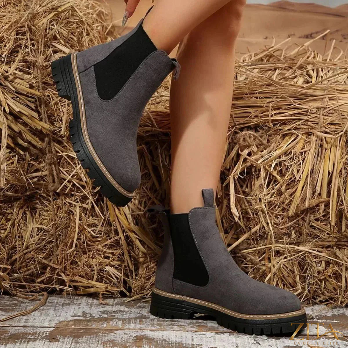 Zita La Belle Elite round toe platform boots with chunky heels and sleek black leather finish.