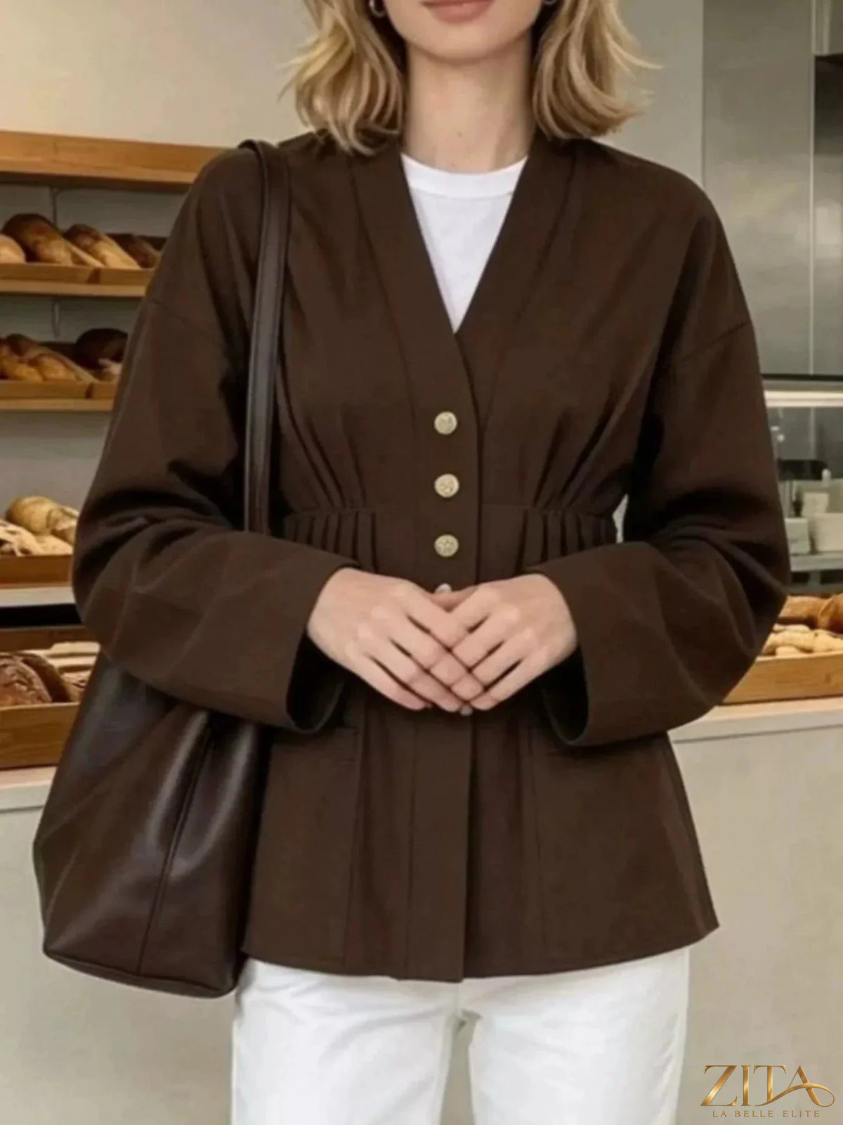 Zita La Belle Elite pleated waist blouse with button detail, featuring a stylish and elegant design with a fitted silhouette.