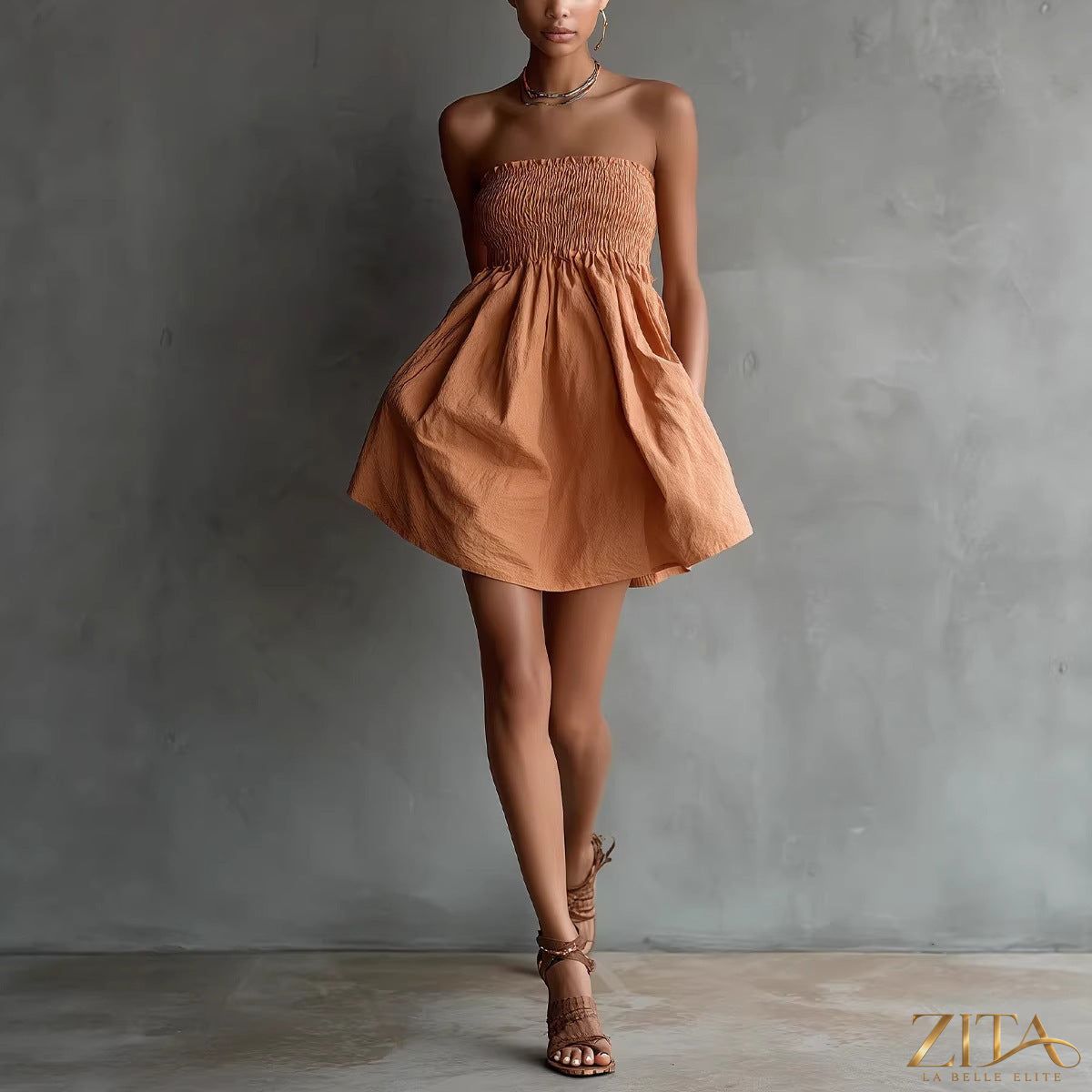 Women's strapless tube mini dress by Zita La Belle Elite, solid color casualwear with elastic waist and sleeveless design.
