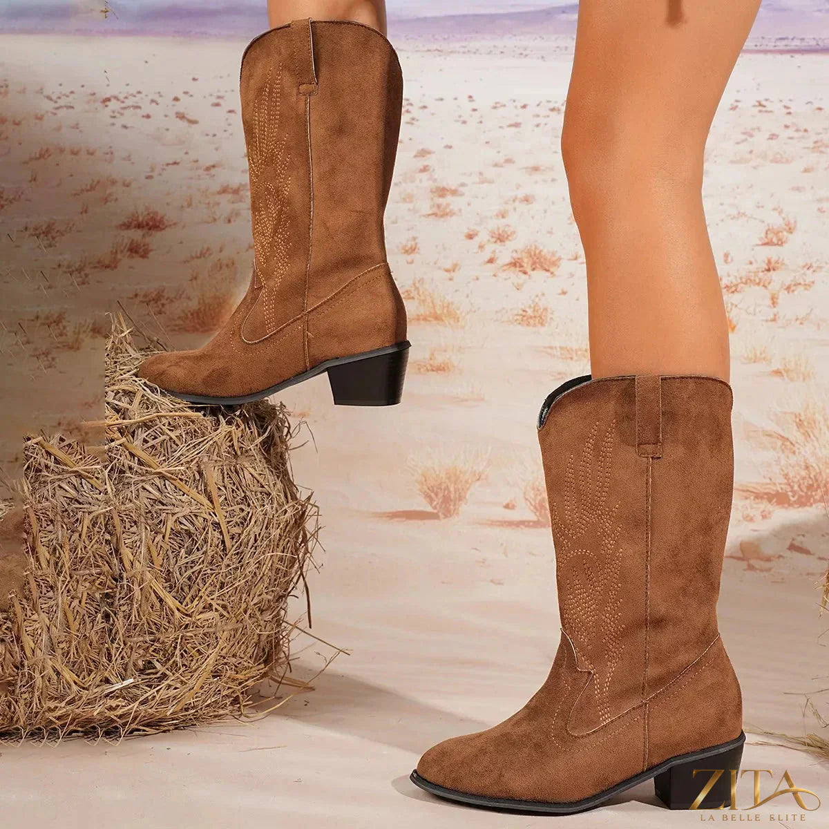 Zita La Belle Elite point toe block heel boots featuring sleek design and stylish silhouette, shown in black leather with chunky heels.