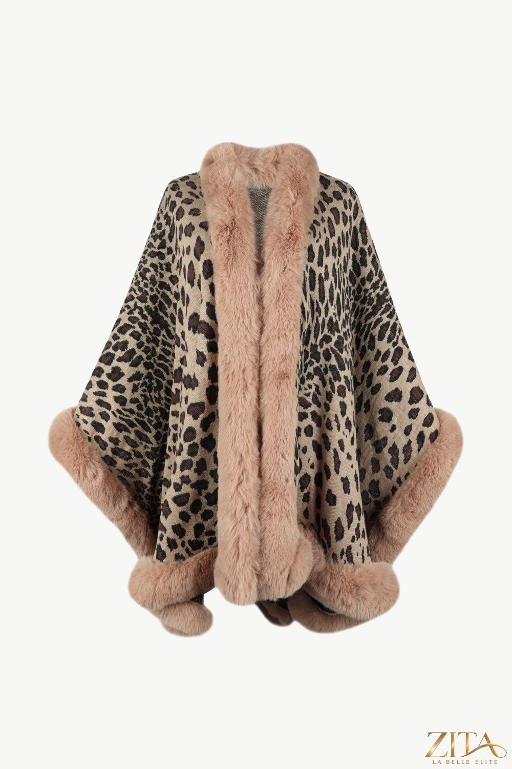 Leopard open front poncho from Trendsi, featuring a stylish animal print and flowing fabric, draped over a neutral outfit.