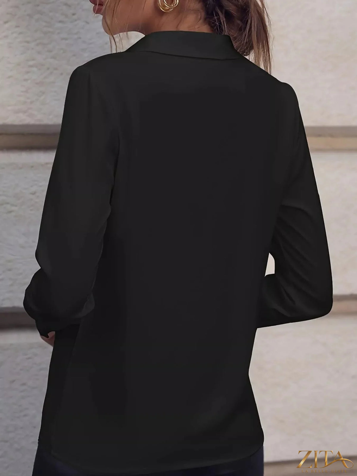 Long sleeve satin blouse by Zita La Belle Elite, shown in a sleek, smooth fabric with a classic collar and button front.