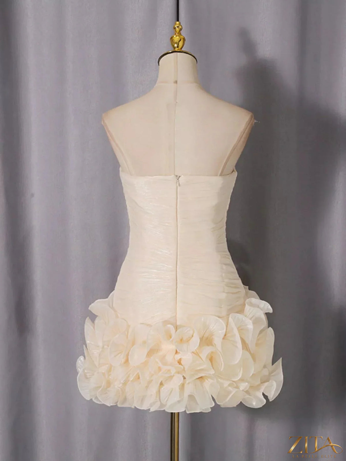 Strapless ruffle ruched mini dress by Trendsi featuring a fitted bodice and playful ruffle details, perfect for summer outings.