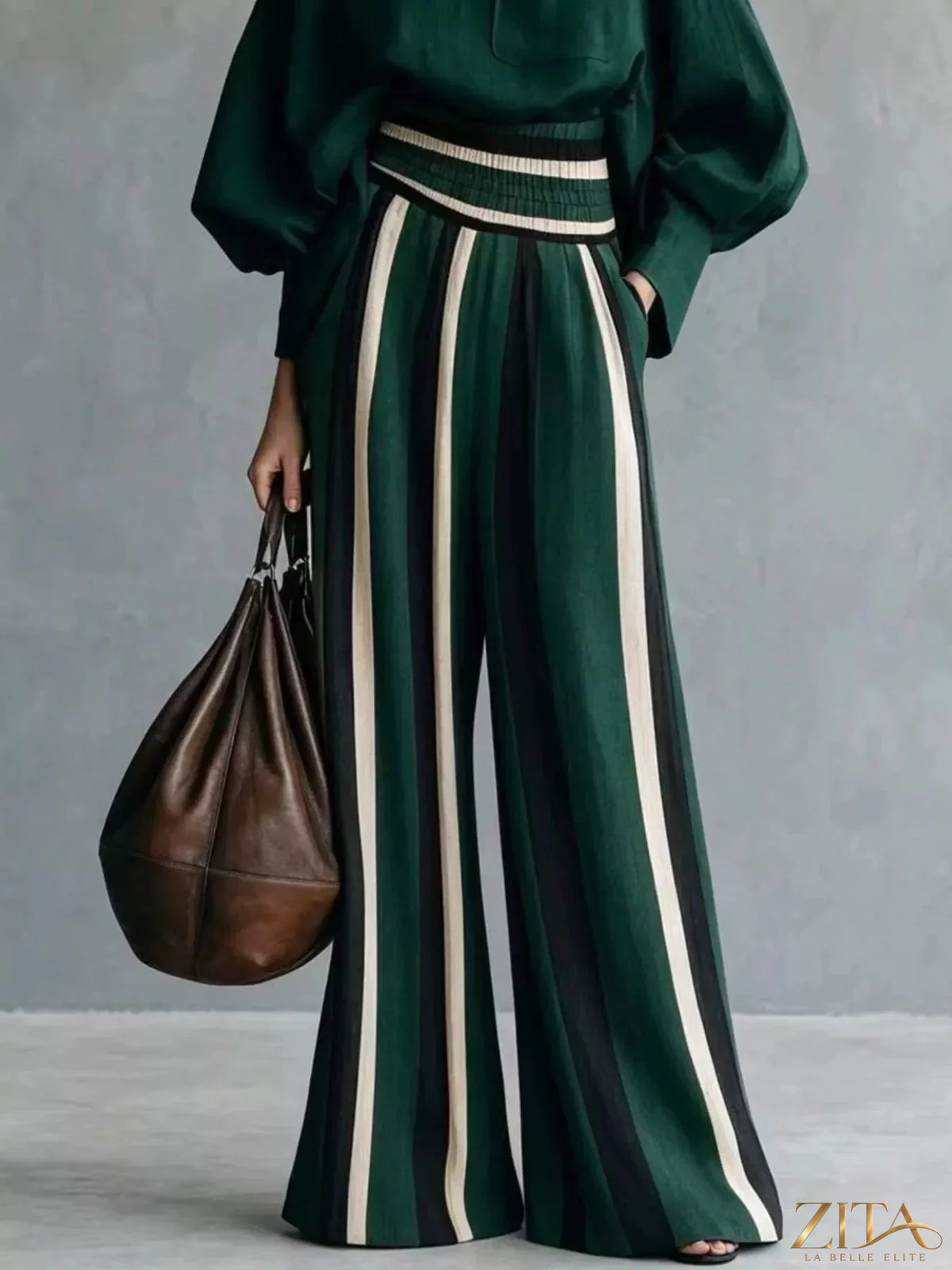 Plus size Trendsi full size mock neck top with striped wide-leg pants set, featuring a stylish, comfortable coordinated outfit.