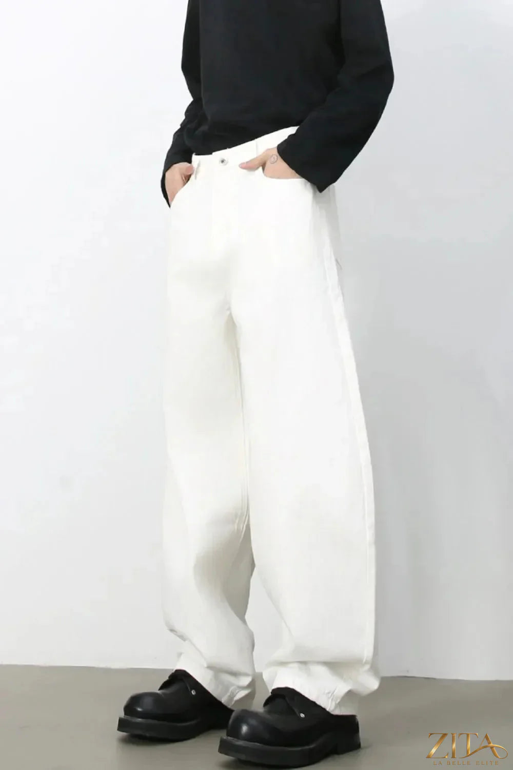 Men's high rise wide leg jeans by Zita La Belle Elite, showing the fit and denim fabric details.