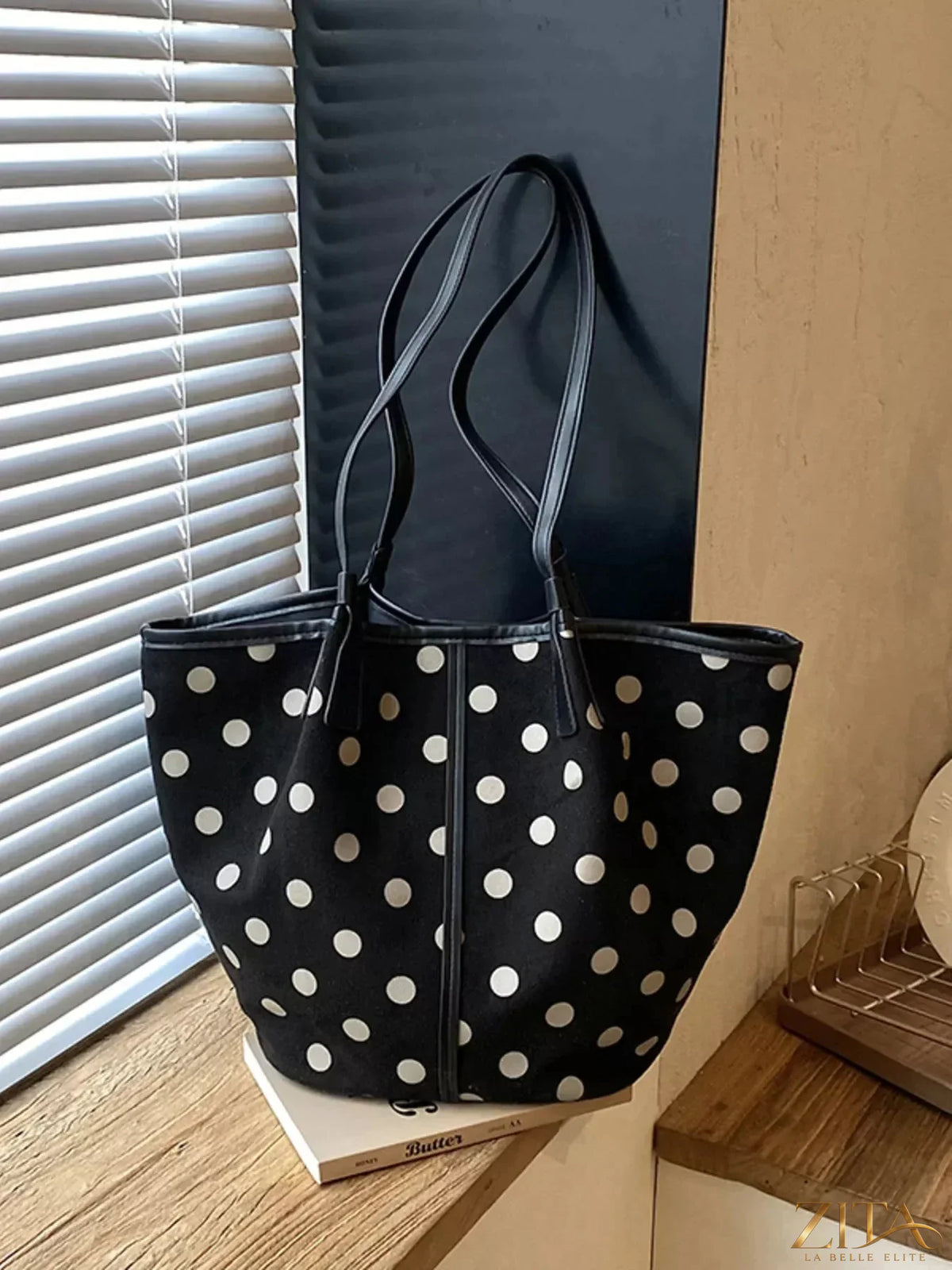Zita La Belle Elite polka dot tote bag with black and white design and sturdy handles, perfect for casual everyday use.
