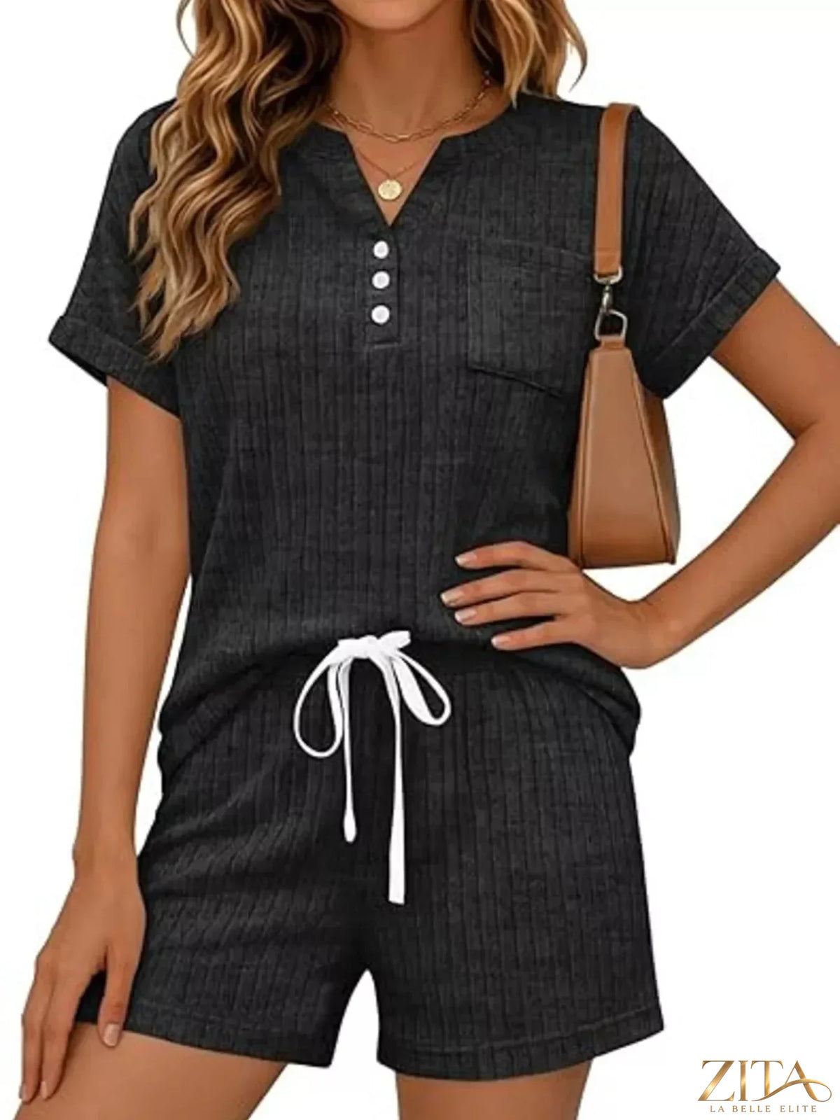 Casual ribbed knit tee and shorts set by Trendsi, featuring a comfortable, matching ribbed fabric design for relaxed summer wear.