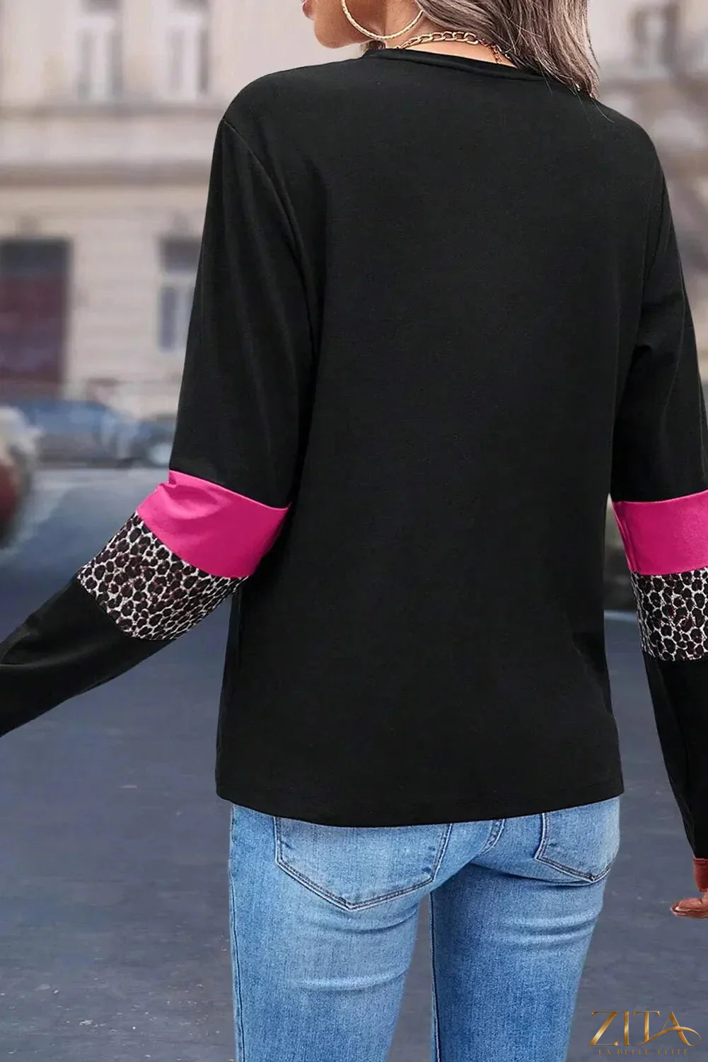 Zita La Belle Elite leopard print round neck long sleeve blouse, stylish and fitted with a chic animal pattern.
