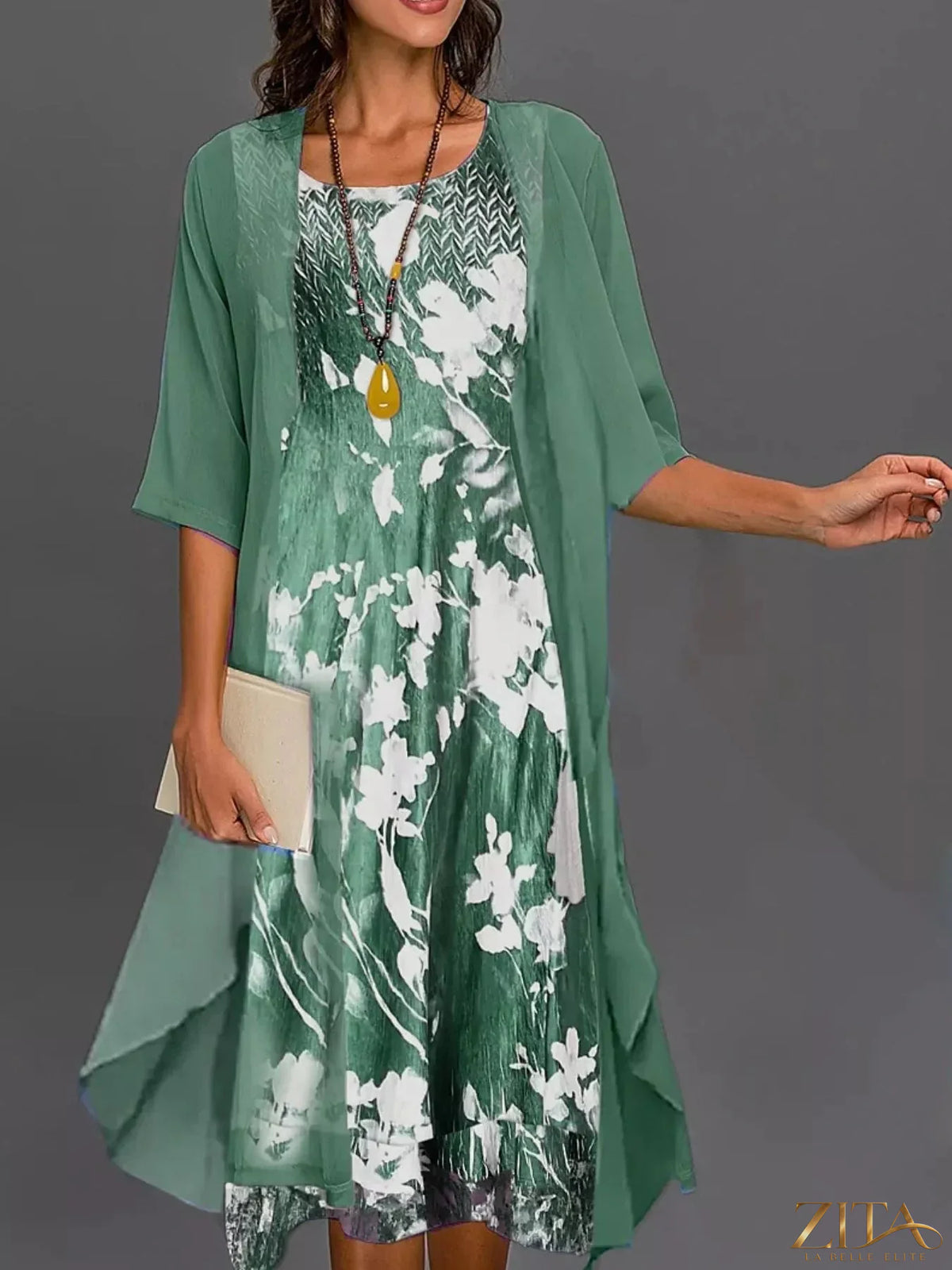 Plus size floral print midi dress with chiffon cardigan set by Zita La Belle Elite, featuring vibrant patterns and lightweight fabric.