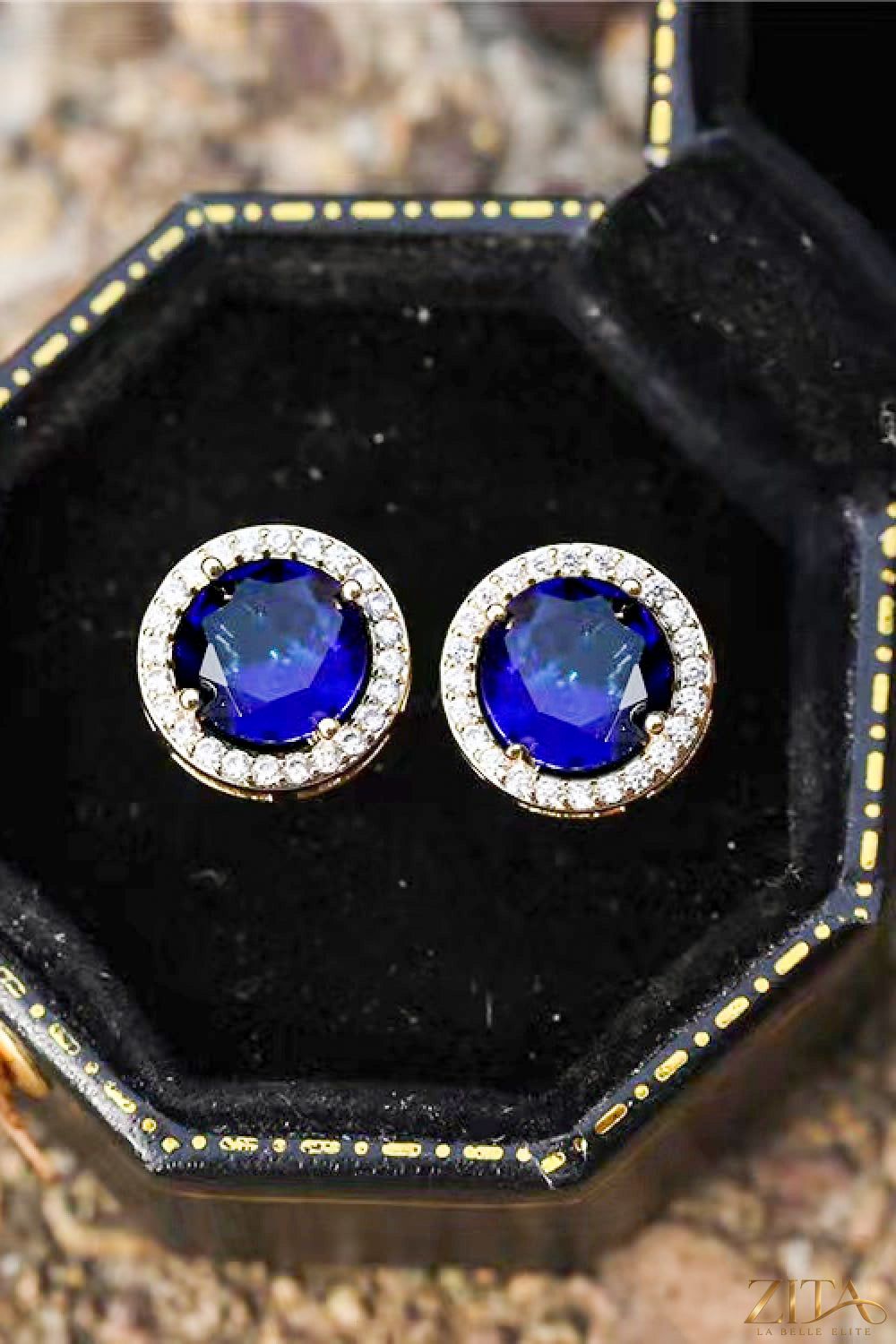 Contrast 2 carat moissanite platinum-plated stud earrings featuring sparkling round stones on a sleek silver setting.