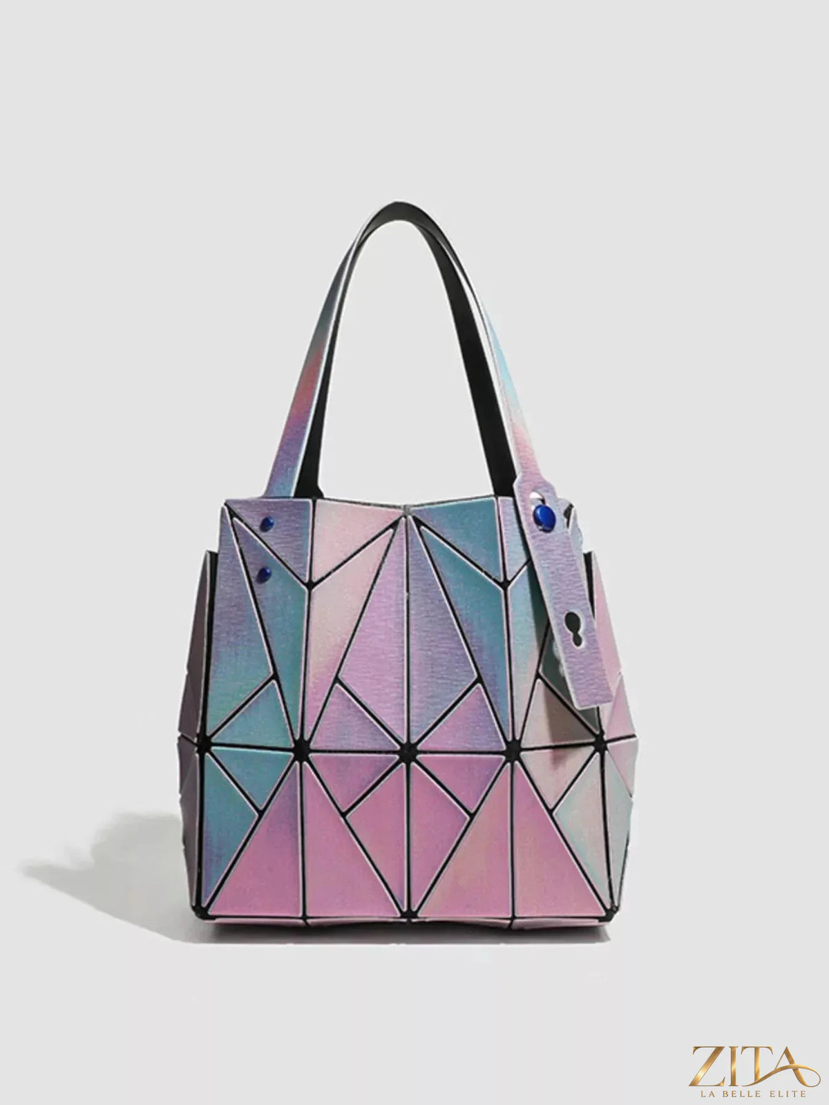 Iridescent geometric shoulder bag by Zita La Belle Elite, featuring a modern shape and shiny, reflective surface.