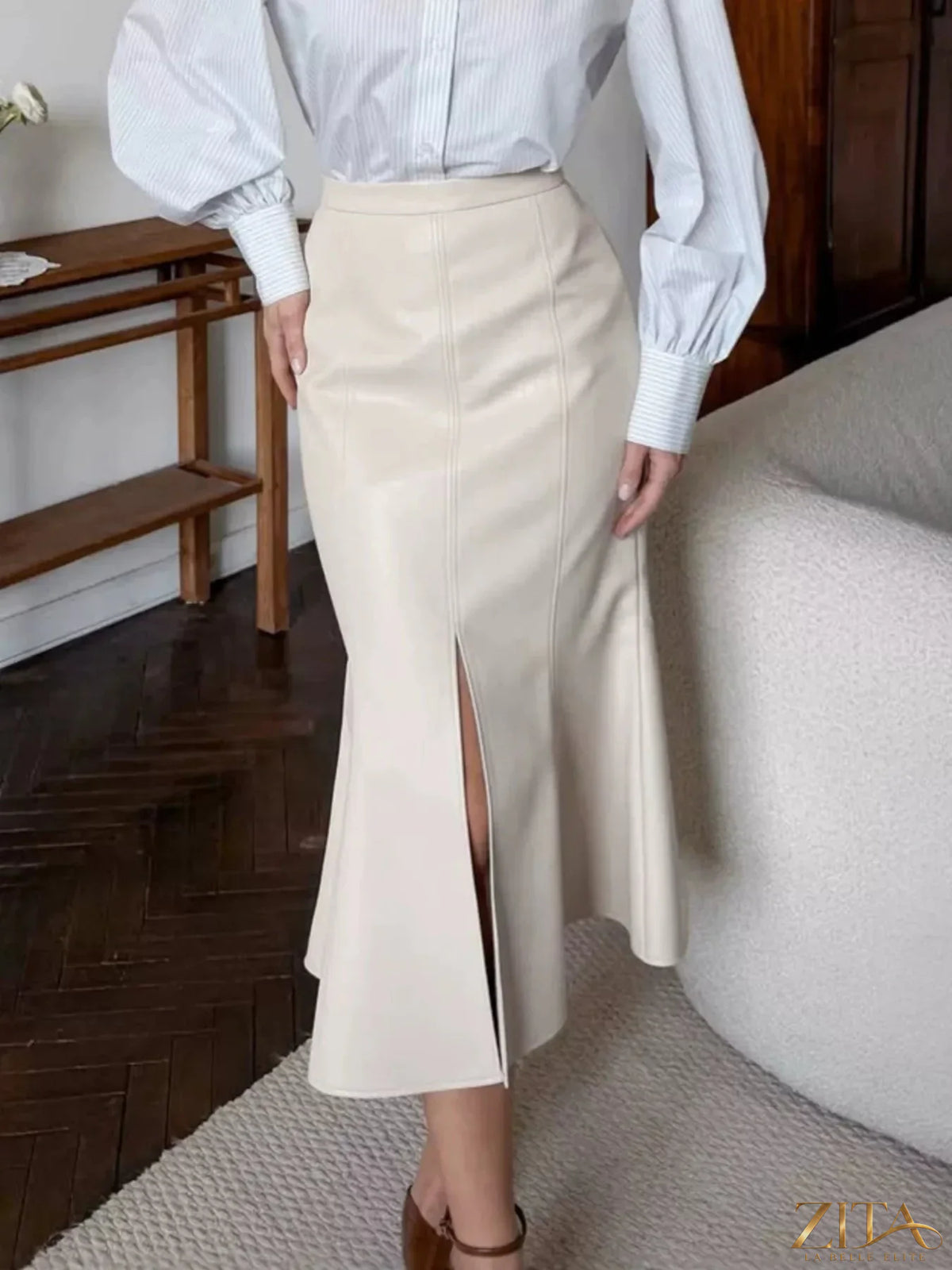 Zita La Belle Elite slit mermaid midi skirt in black with fitted waist and flowing hem, perfect for elegant wardrobe styling.