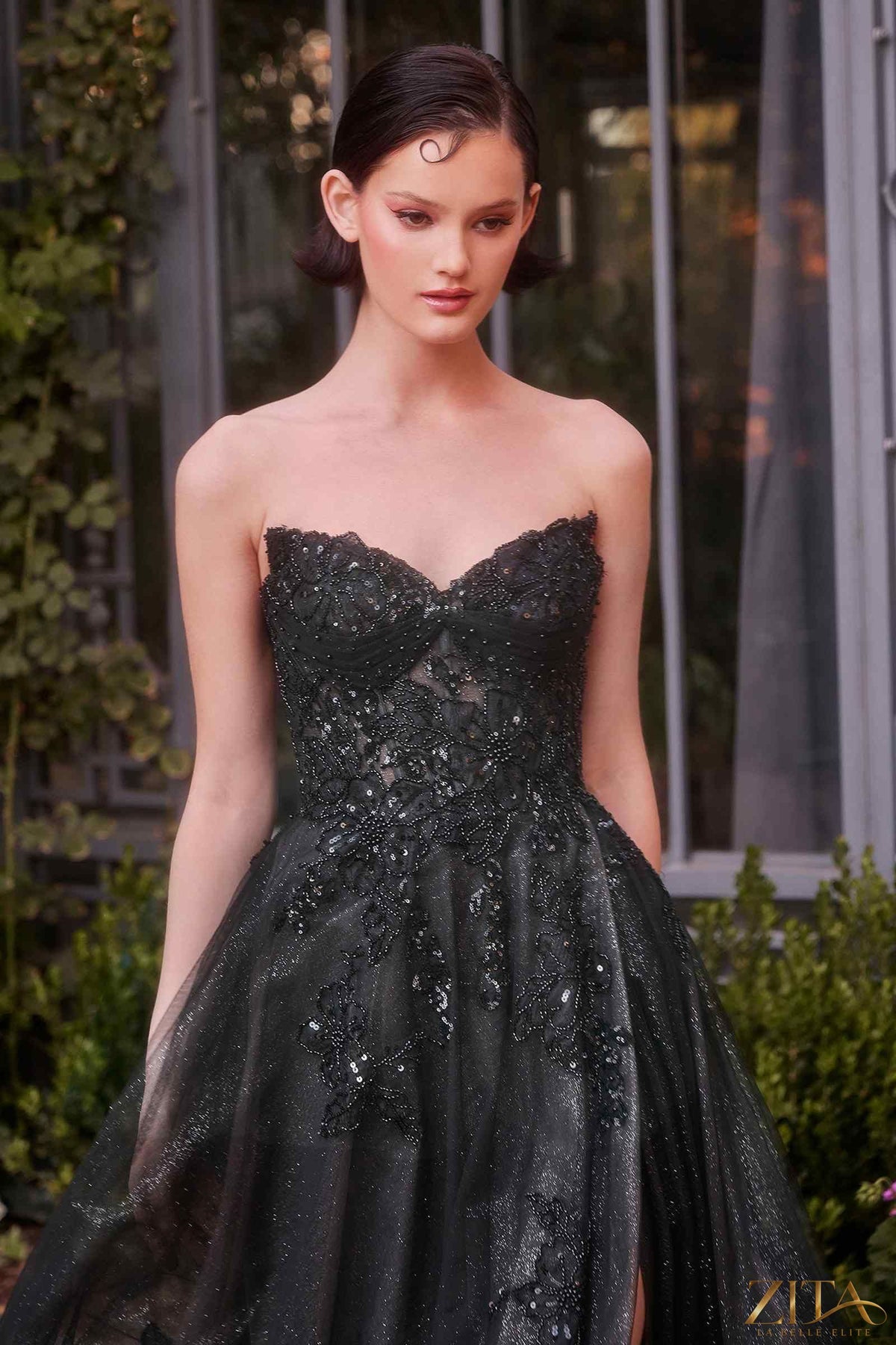 Elegant strapless layered tulle ball gown by Zita La Belle Elite featuring a black and nude design, perfect for formal occasions.
