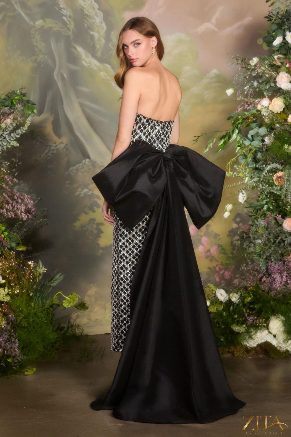 Back view of Zita La Belle Elite fitted black column gown with crystal lattice beadwork, elegant evening dress.
