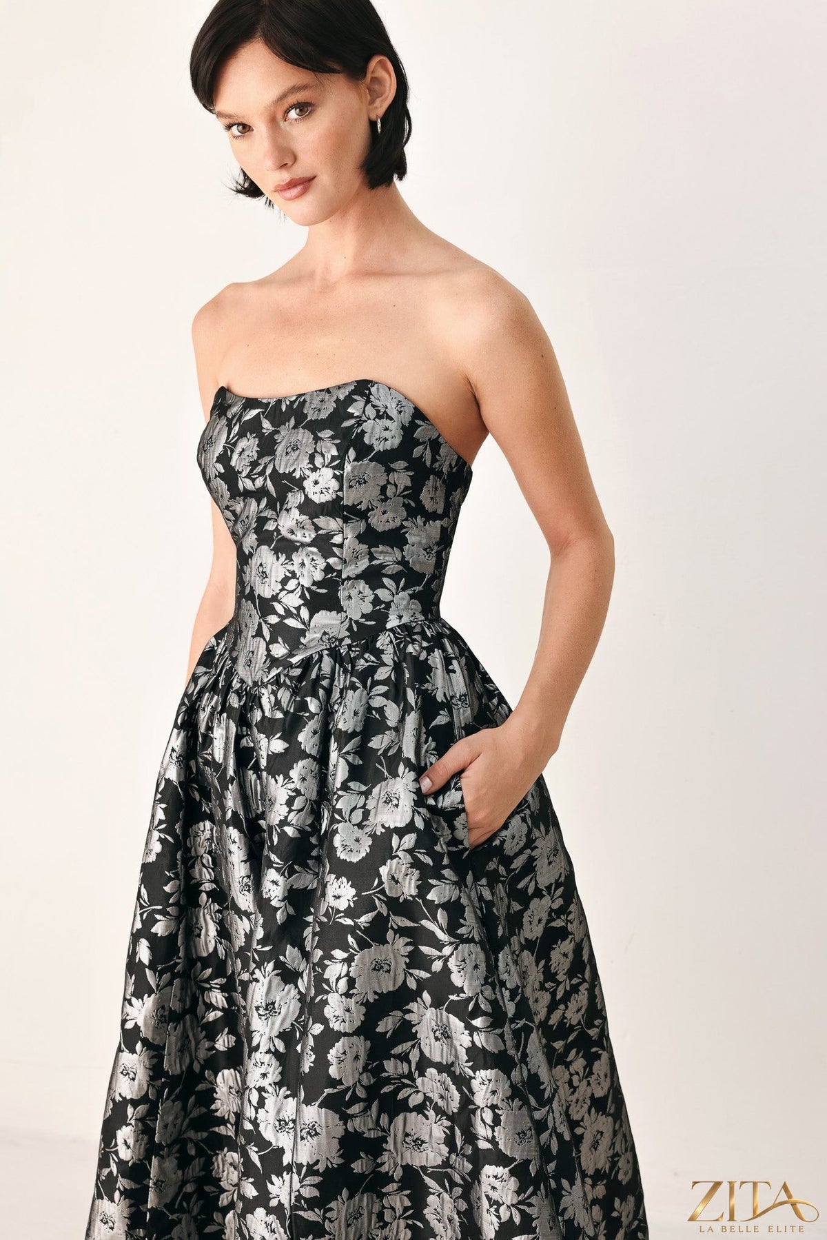 Black Midnight Sparkle Sweetheart Midi Dress by Zita La Belle Elite, showcasing a fitted bodice and shimmering silver accents.