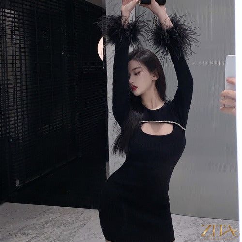 Black party dress with ostrich feather by Zita La Belle Elite, featuring a stylish design perfect for evening events.