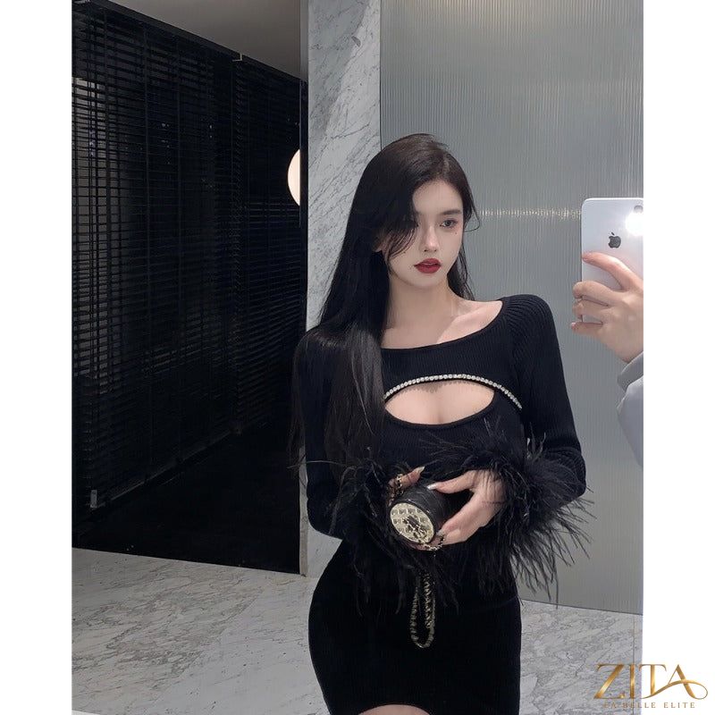 Black party dress with ostrich feather details from Zita La Belle Elite, showcasing elegant fabric and stylish design.
