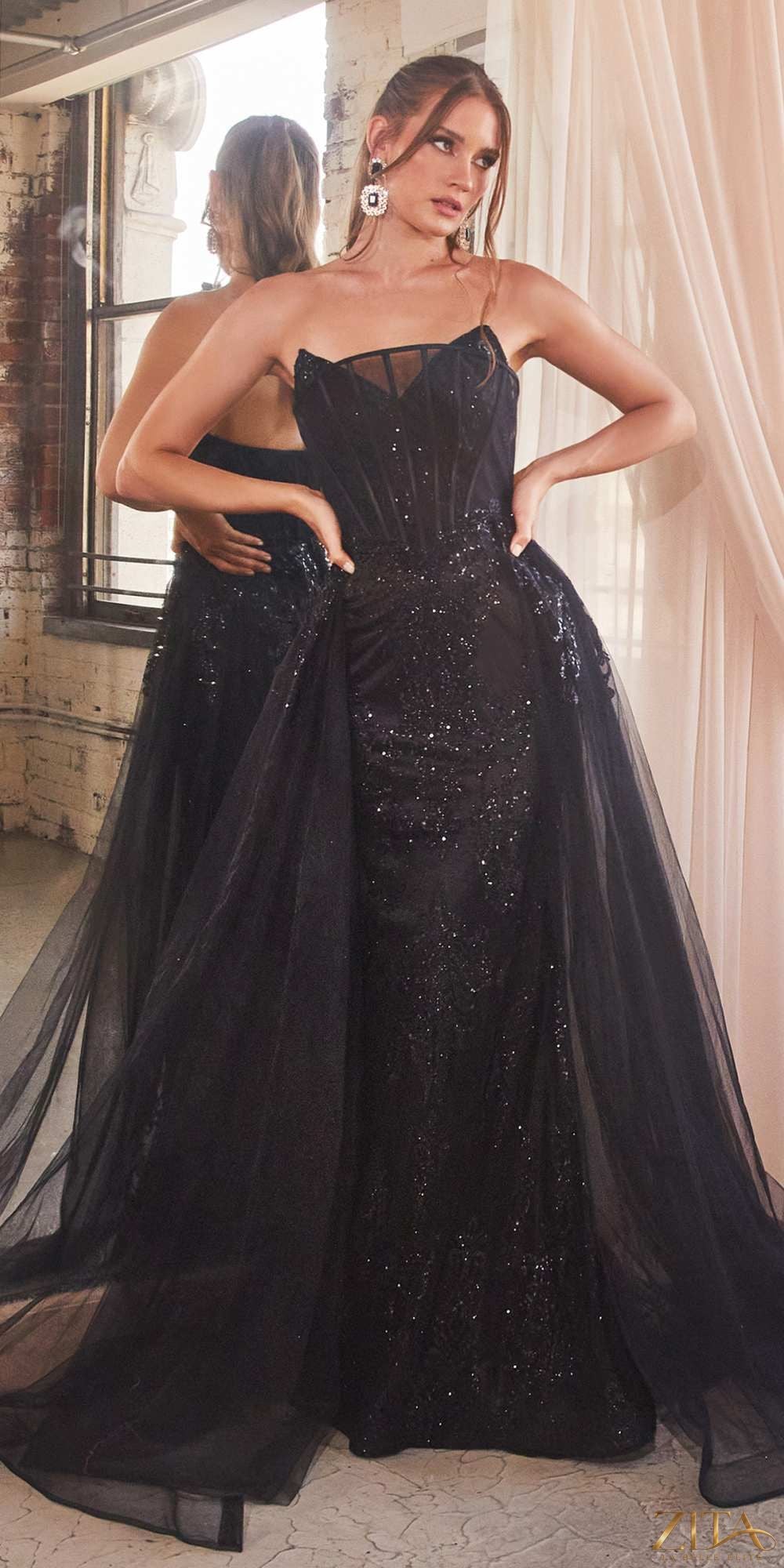 Black Cinderella Divine J858 strapless glitter mermaid gown by Zita La Belle Elite, showcasing a fitted silhouette and sparkling fabric.